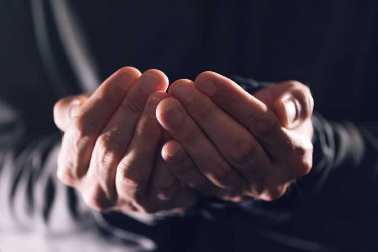 Cupped hands asking for money, poor male beggar needs charity and help Cupped hands asking for money, poor male beggar needs charity and help